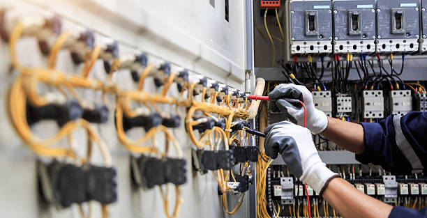 Professional Electrician technician working in Arcade, GA